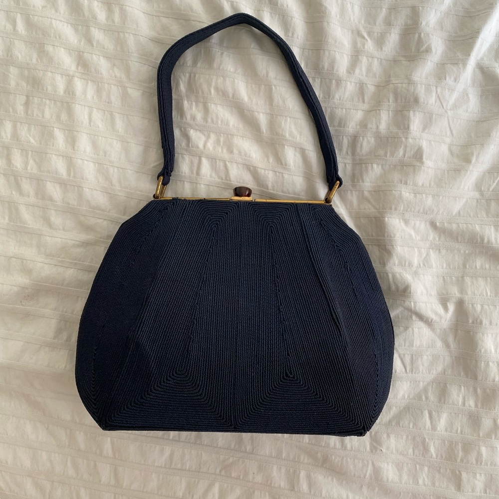 Vintage structured textured handbag clutch